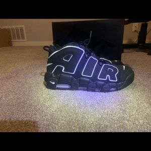 Nike uptempo black 
Size 11 
Worn once no box proof of purchase thru goat